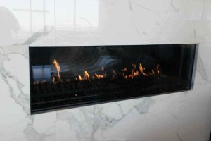 Modern burning fireplace with a sleek design and bright flames Modern burning fireplace with a sleek design and bright flames in Washington, DC